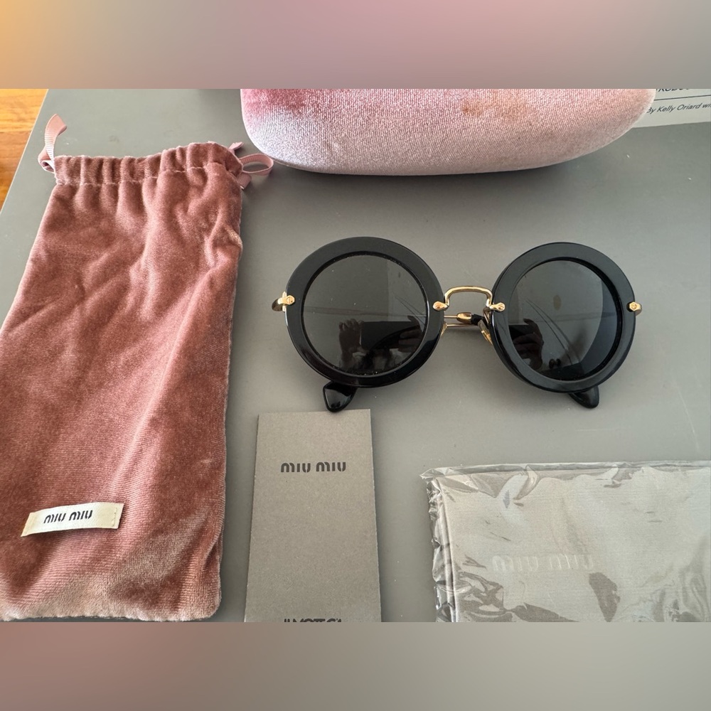 Miu Miu Black and Gold Round Sunglasses